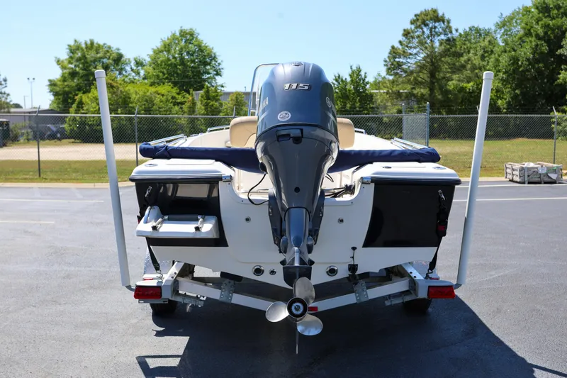 Slide: The Image of 2016 Key West 176 Center Console boat with Yamaha 115 engine on trailer. - 2
