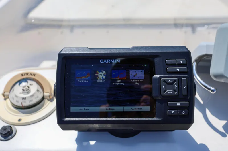 Slide: The Image of Garmin navigation system on 2016 Key West 176 Center Console boat dashboard. - 8