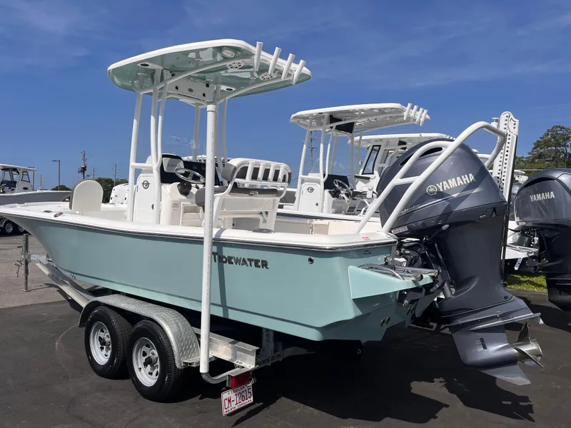 Slide: The Image of 2020 Tidewater 2210 Carolina Bay boat with Yamaha engine on trailer. - 2