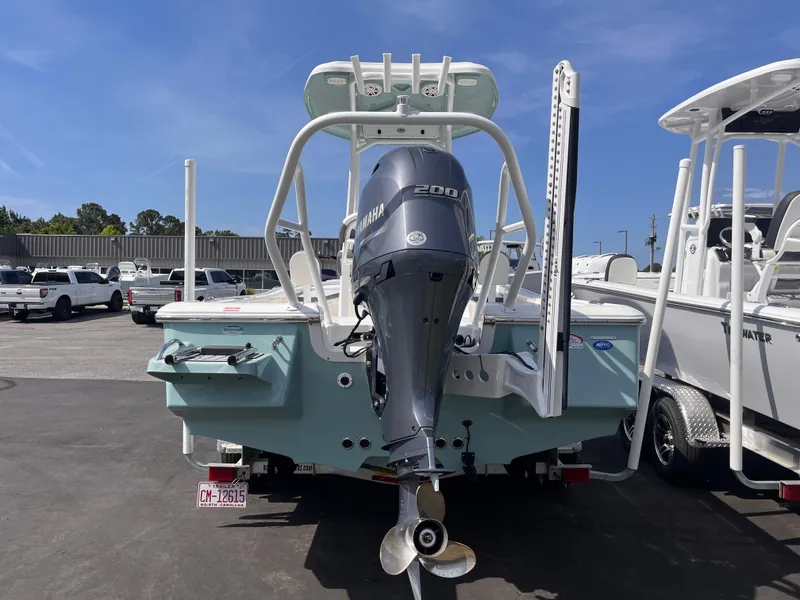 Slide: The Image of 2020 Tidewater 2210 Carolina Bay boat with Yamaha 200 engine, parked in a lot. - 3