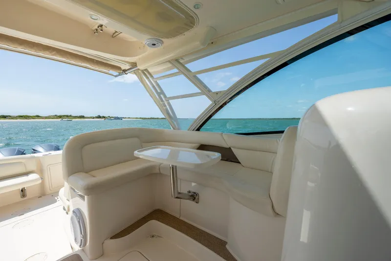 Slide: The Image of Interior of 2015 Grady-White Freedom 375 boat with ocean view and seating area. - 18