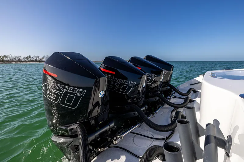 Slide: The Image of 2023 Yellowfin 39 Offshore boat with four powerful Racing 450 engines on open water. - 13