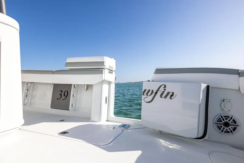 Slide: The Image of 2023 Yellowfin 39 Offshore boat deck with ocean view and clear blue sky. - 17