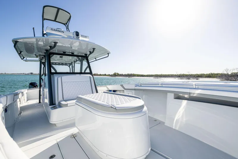 Slide: The Image of 2023 Yellowfin 39 Offshore boat on water, featuring sleek design and spacious deck. - 31