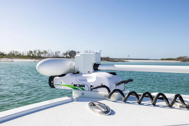 Slide: The Image of 2023 Yellowfin 39 Offshore boat with advanced radar system on calm water. - 36