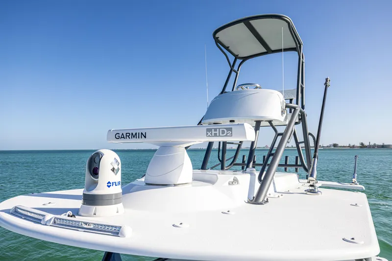 Slide: The Image of 2023 Yellowfin 39 Offshore boat with Garmin xHD2 radar on open water. - 42