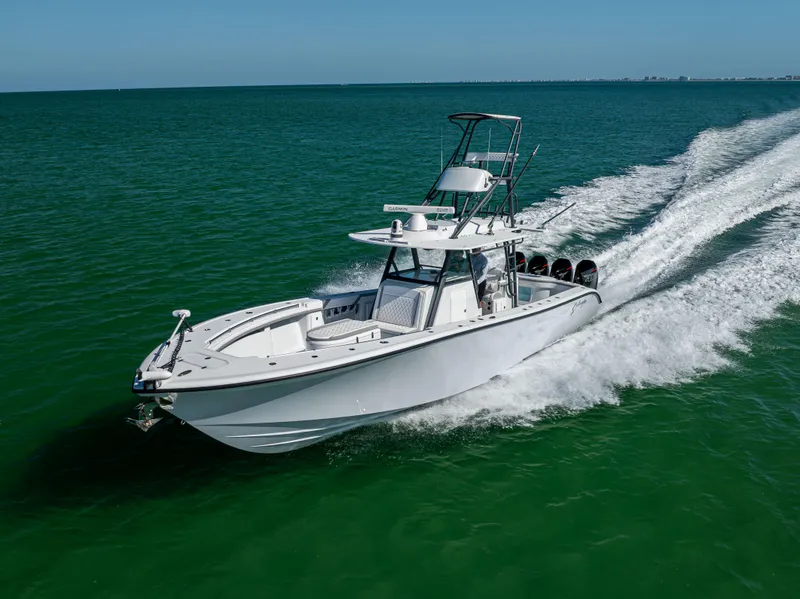 Slide: The Image of 2023 Yellowfin 39 Offshore boat cruising on open water, showcasing sleek design and powerful performance. - 8