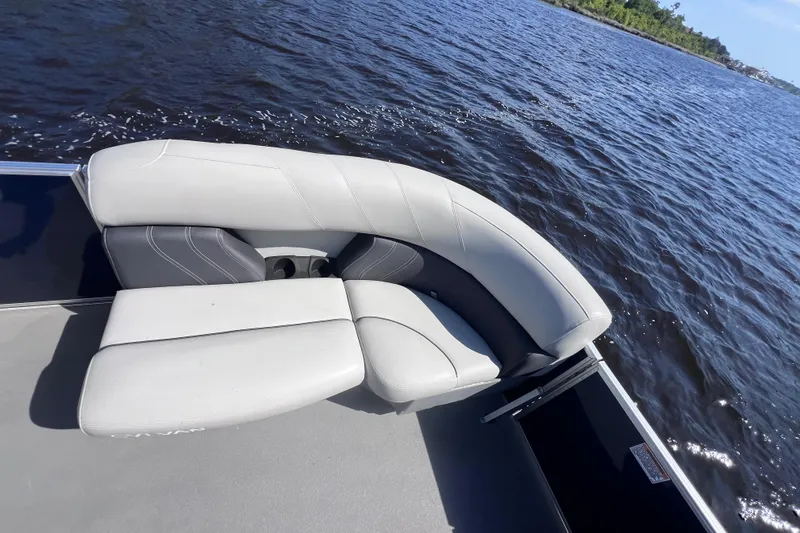 Slide: The Image of 2022 Sylvan Mirage 820 PARTY FISH boat with comfortable seating on a sunny day. - 14