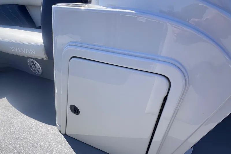 Slide: The Image of 2022 Sylvan Mirage 820 PARTY FISH boat storage compartment detail. - 16