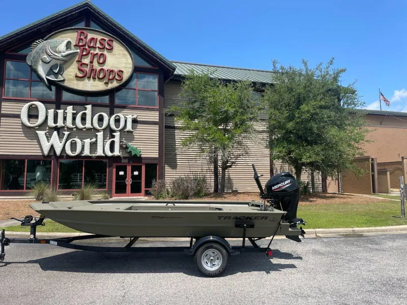 Slide: The Image of 2025 Tracker Grizzly 1654 T Sportsman boat outside Bass Pro Shops Outdoor World. - 6