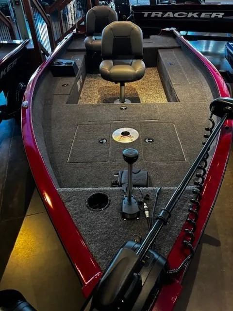 Slide: The Image of 2025 Tracker Super Guide V-16 T fishing boat with dual seats and trolling motor. - 2