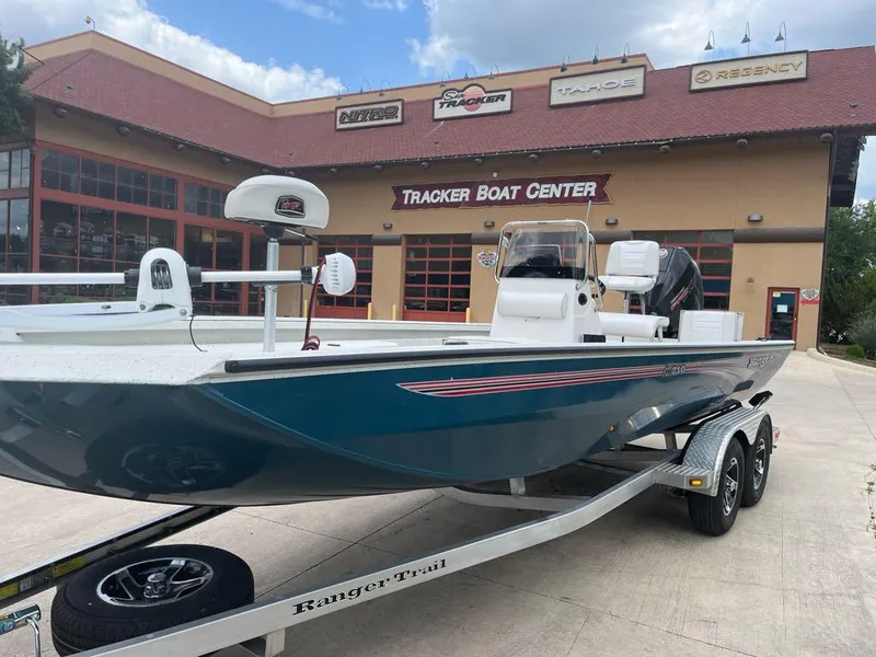 Slide: The Image of 2025 Ranger RB210 boat on trailer at Tracker Boat Center. - 2