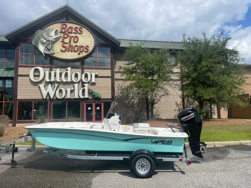 Slide: The Image of 2025 Mako Pro Skiff 15 CC boat outside Bass Pro Shops Outdoor World. - 5
