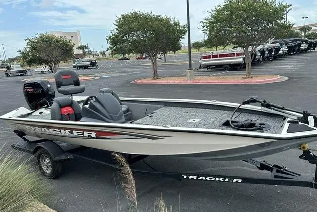 Slide: The Image of 2025 Tracker Pro Team 190 fishing boat on trailer in parking lot. - 4