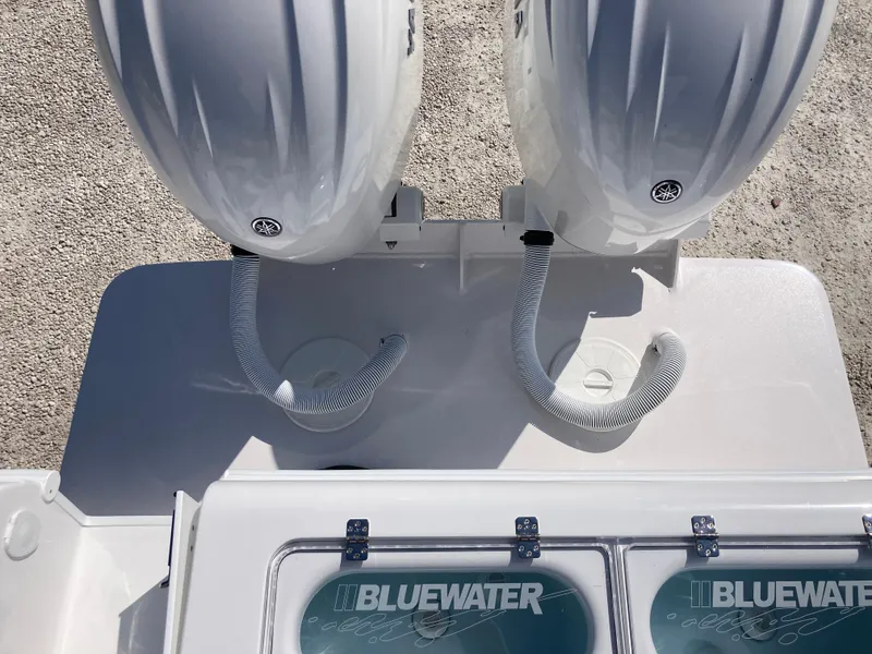 Slide: The Image of 2025 Bluewater II25T boat with dual engines and livewell, top view. - 33