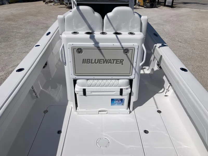 Slide: The Image of 2025 Bluewater II25T boat interior with seating and storage compartments. - 6