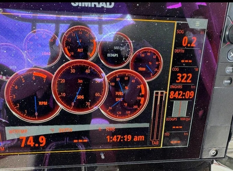 Slide: The Image of Simrad marine display showing gauges and data on a 2017 Sportsman Open 282 Center Console. - 22
