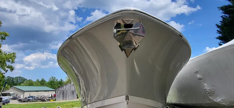 Slide: The Image of 2017 Sportsman Open 282 Center Console boat under a clear blue sky. - 3