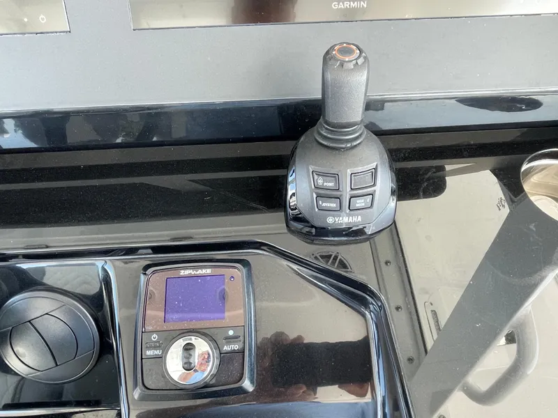 Slide: The Image of Control panel of a 2021 Everglades 395cc boat with Yamaha joystick and Garmin display. - 20
