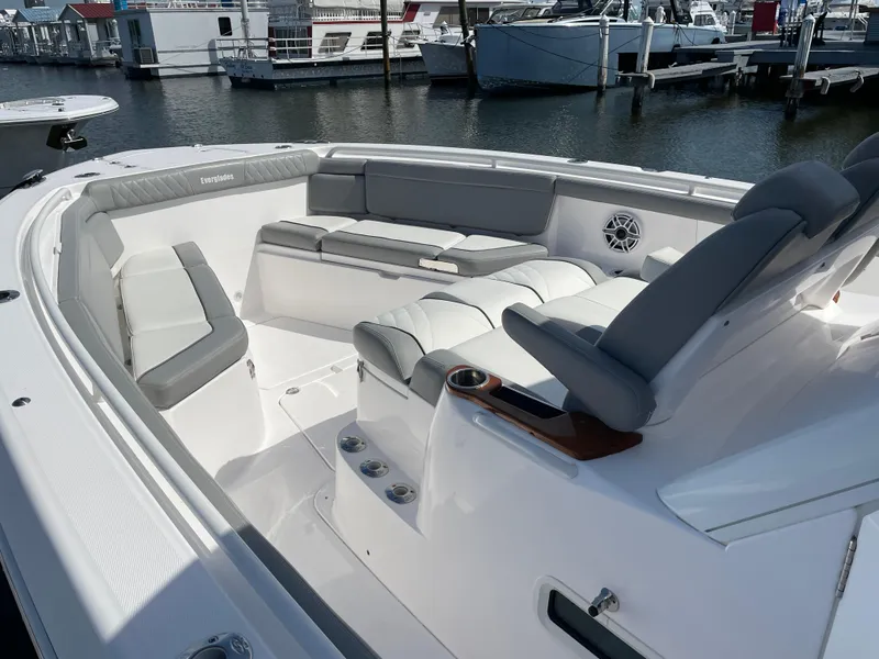 Slide: The Image of Luxurious 2021 Everglades 395cc boat interior with spacious seating at marina. - 7