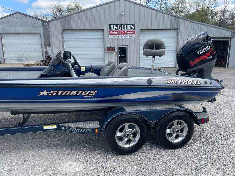 Slide: The Image of 2005 Stratos 200 ProXL boat with Yamaha engine, parked outside Anglers Outpost & Marine. - 4