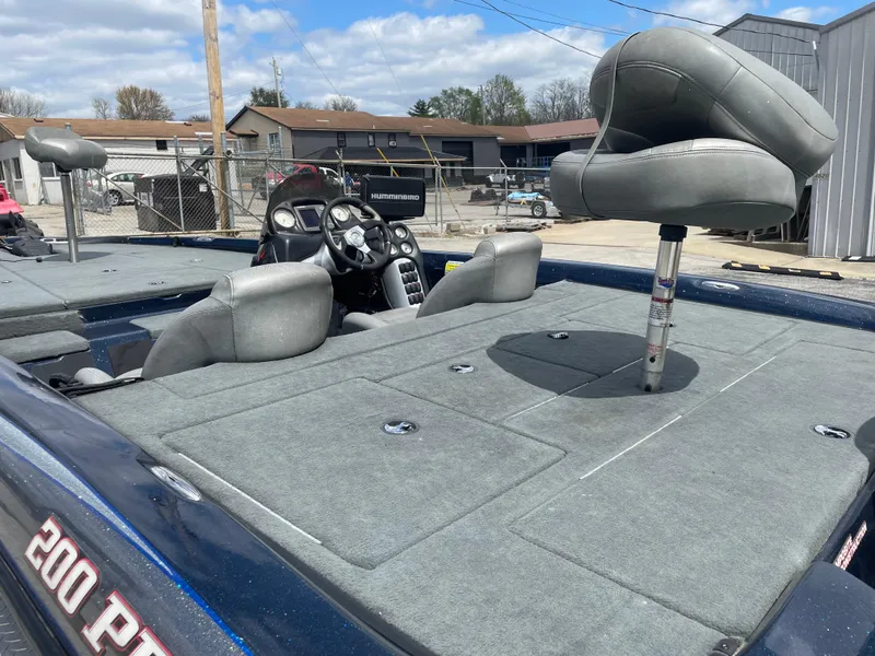 Slide: The Image of 2005 Stratos 200 ProXL boat with gray seating and spacious deck. - 7