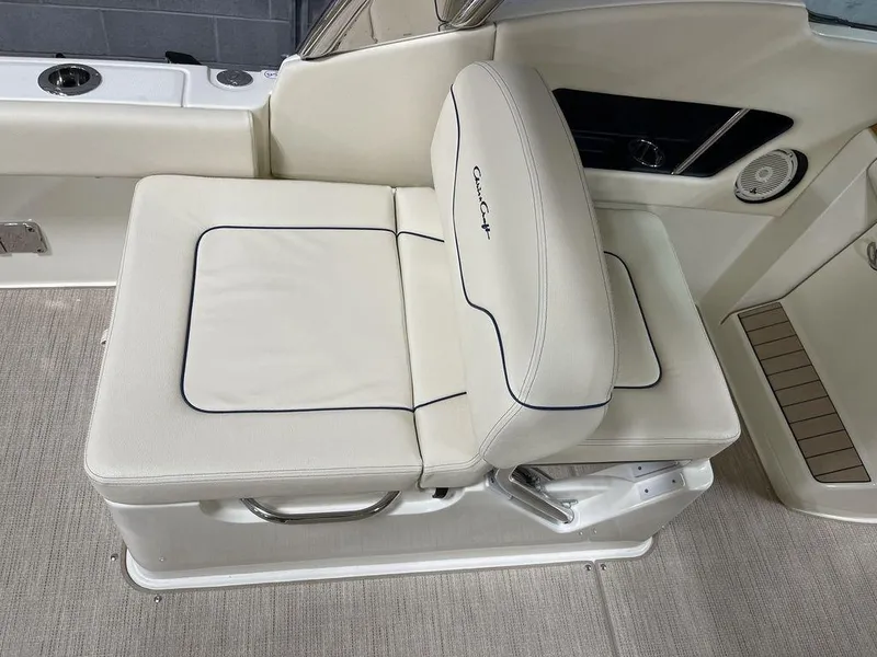 Slide: The Image of 2023 Chris-Craft 24 CALYPSO boat seat with white upholstery and sleek design. - 16