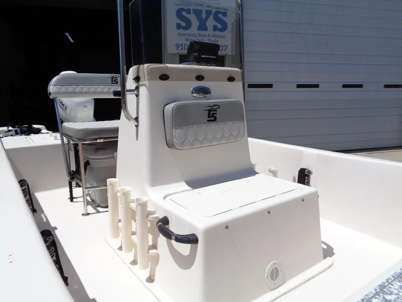 Slide: The Image of 2024 Carolina Skiff EL16JVX boat interior with seating and rod holders. - 7