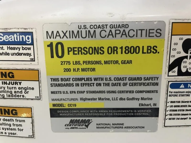 Slide: The Image of U.S. Coast Guard capacity label for 2017 Hurricane 19 CC boat, 10 persons or 1800 lbs, 200 HP motor. - 14
