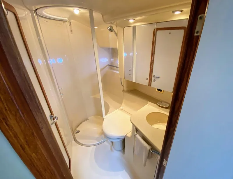 Slide: The Image of Luxurious bathroom in 2001 Sea Ray 460 Sundancer yacht with shower and vanity. - 11