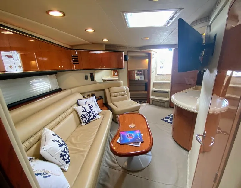 Slide: The Image of Luxurious interior of 2001 Sea Ray 460 Sundancer yacht with leather seating and modern amenities. - 12
