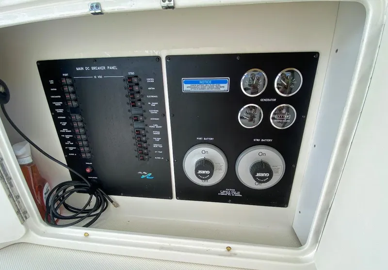 Slide: The Image of Electrical control panel on a 2001 Sea Ray 460 Sundancer boat. - 36