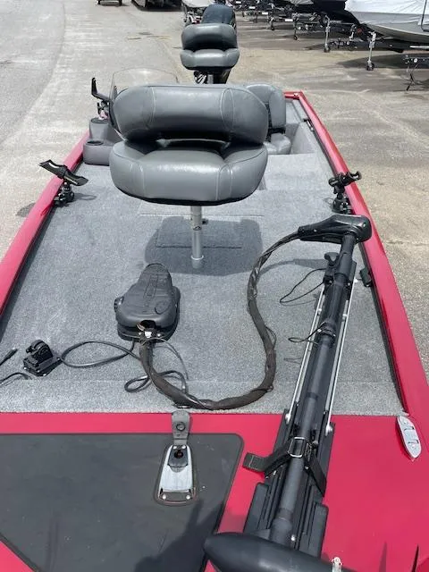 Slide: The Image of 2022 Tracker PRO170 boat with gray seating and fishing equipment on deck. - 4