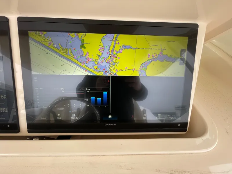 Slide: The Image of Garmin navigation display on 2018 Grady-White Canyon 376 boat, showing detailed marine chart. - 33