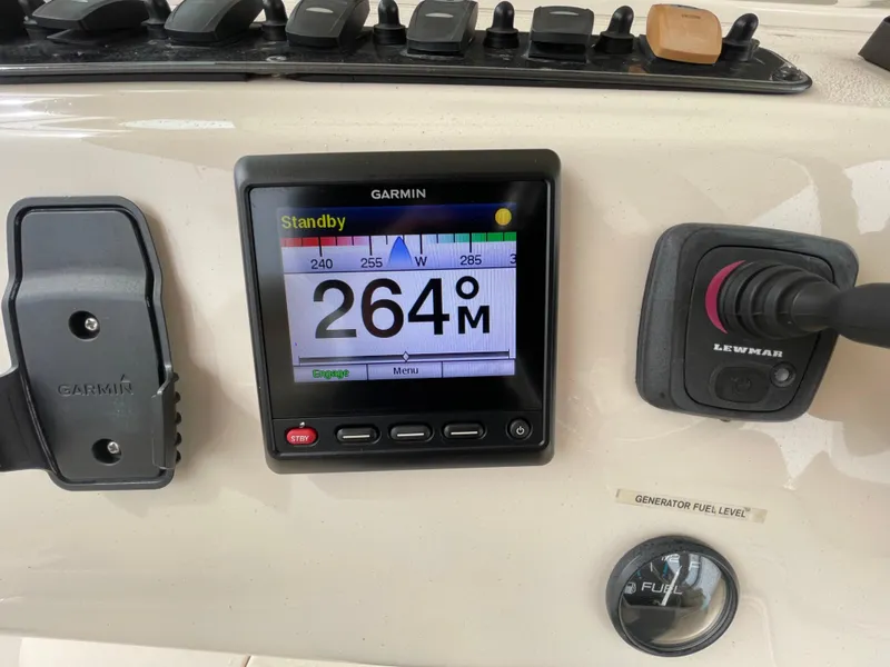 Slide: The Image of Garmin navigation display on 2018 Grady-White Canyon 376 boat dashboard. - 35