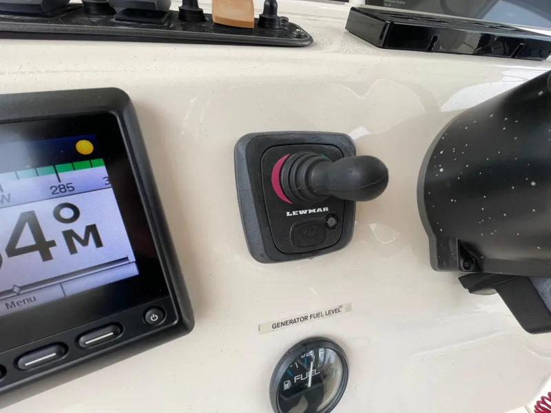 Slide: The Image of Control panel of 2018 Grady-White Canyon 376 boat with Lewmar joystick and display. - 36