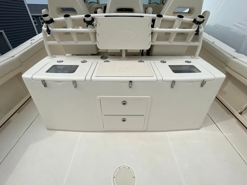 Slide: The Image of 2018 Grady-White Canyon 376 fishing station with rod holders and storage compartments. - 44