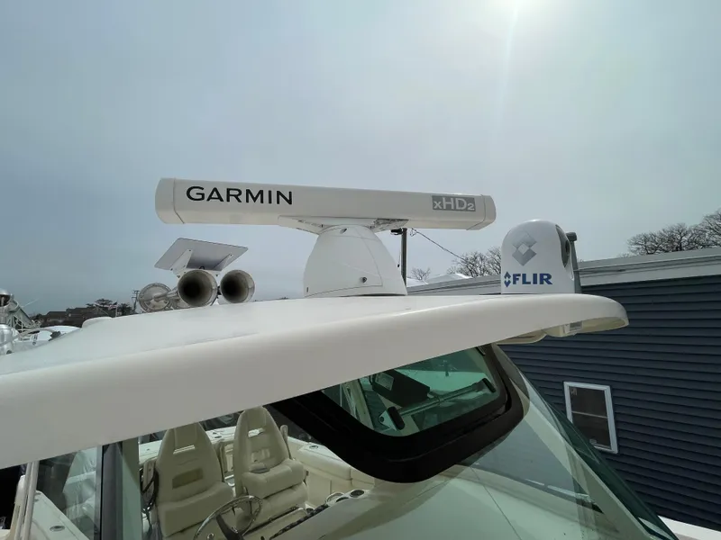 Slide: The Image of 2018 Grady-White Canyon 376 boat with Garmin and FLIR equipment on the roof. - 49
