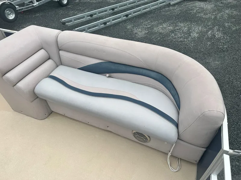 Slide: The Image of 2015 Godfrey Sweetwater 20PE pontoon boat seating with beige and blue upholstery. - 10