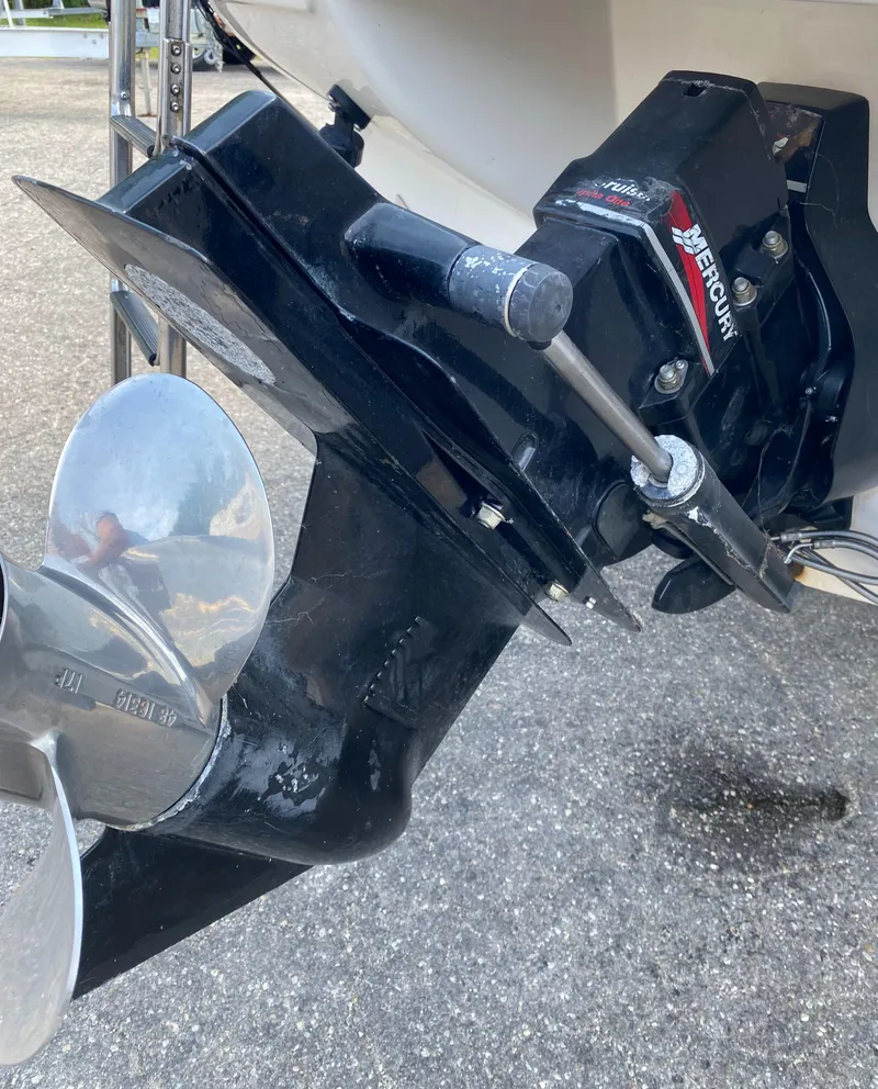 Slide: The Image of Close-up of a 2000 Sea Ray 230 boat's Mercury outboard motor and propeller. - 15
