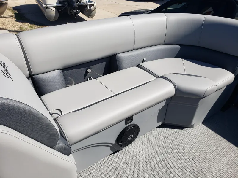 Slide: The Image of 2025 Bentley Pontoons Legacy 243 Navigator Ext interior seating, featuring luxurious gray upholstery. - 7