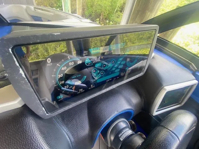Slide: The Image of Dashboard of a 2016 Malibu Wakesetter 25 LSV boat with digital display. - 8