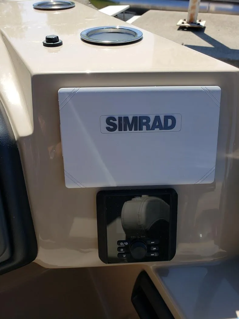 Slide: The Image of 2025 Bentley Pontoons Legacy Navigator dashboard with Simrad navigation system. - 5