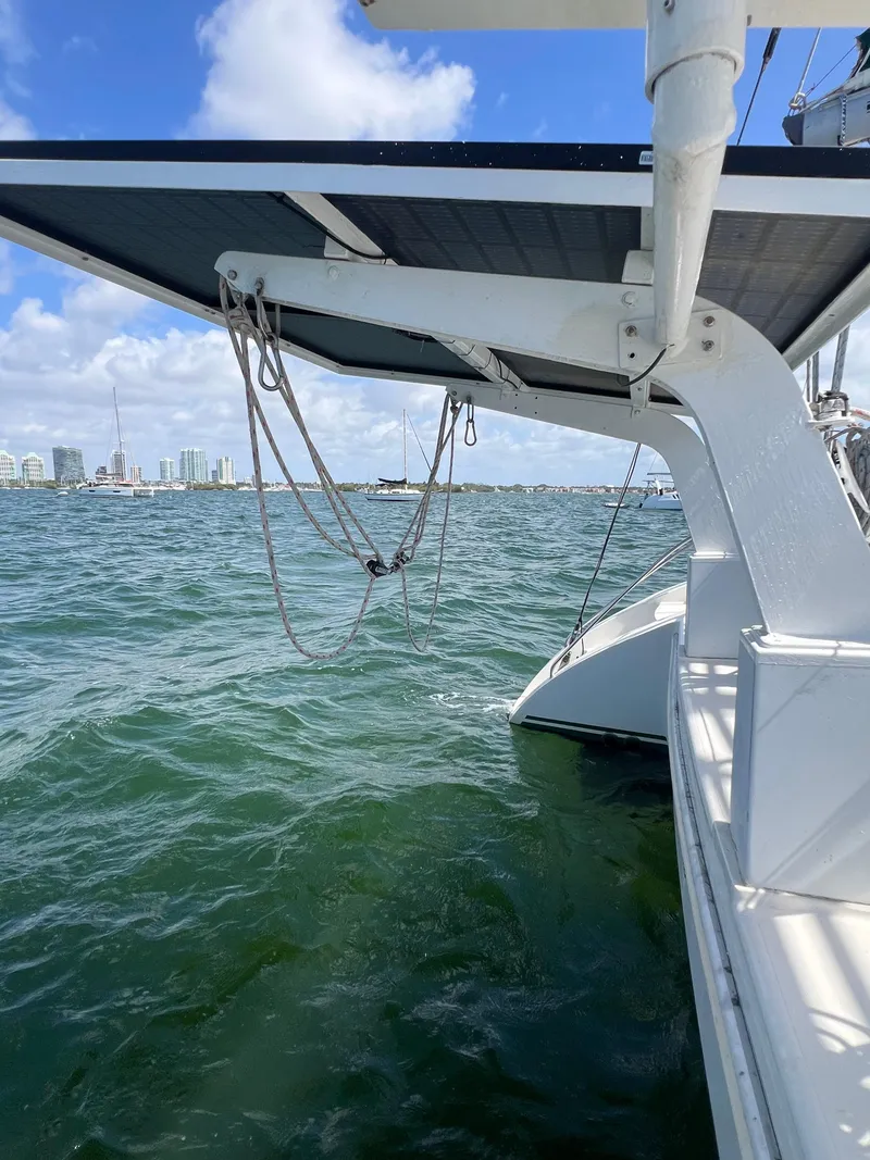 Slide: The Image of Sailing on a 1996 Prout 45 catamaran with city skyline in the background. - 12