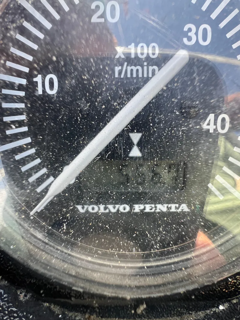 Slide: The Image of Volvo Penta tachometer on a 1996 Prout 45, showing engine RPM. - 23