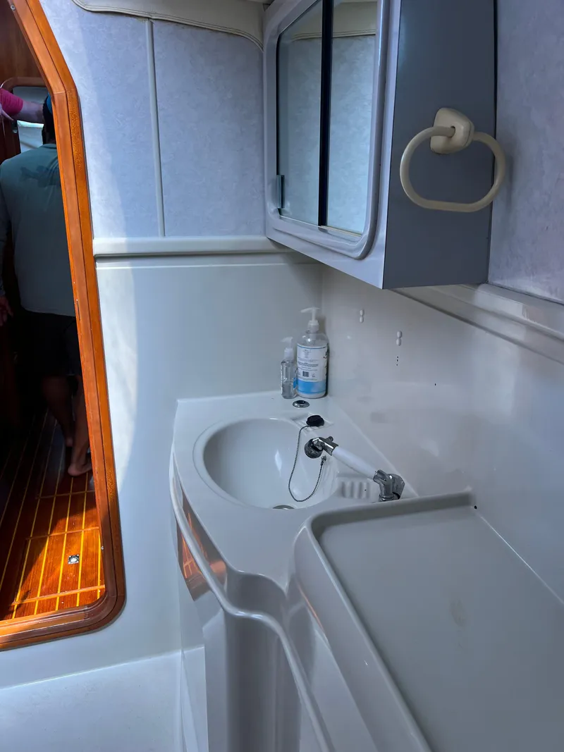 Slide: The Image of Bathroom interior of a 1996 Prout 45 yacht with sink and mirror. - 39
