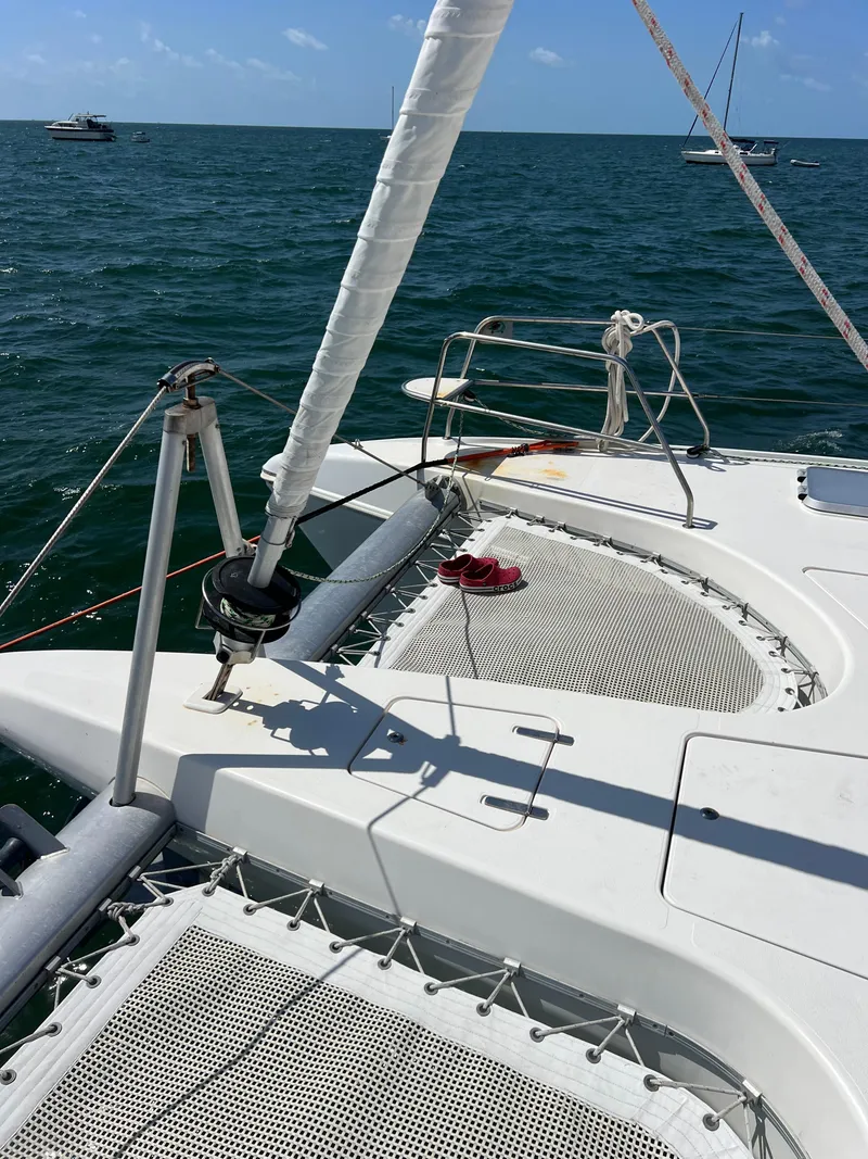 Slide: The Image of 1996 Prout 45 catamaran on open water, featuring deck and rigging details. - 4