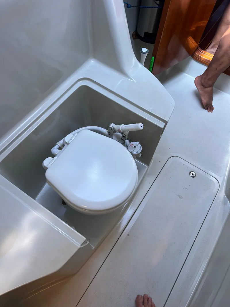 Slide: The Image of Boat bathroom with compact toilet on a 1996 Prout 45 catamaran. - 40