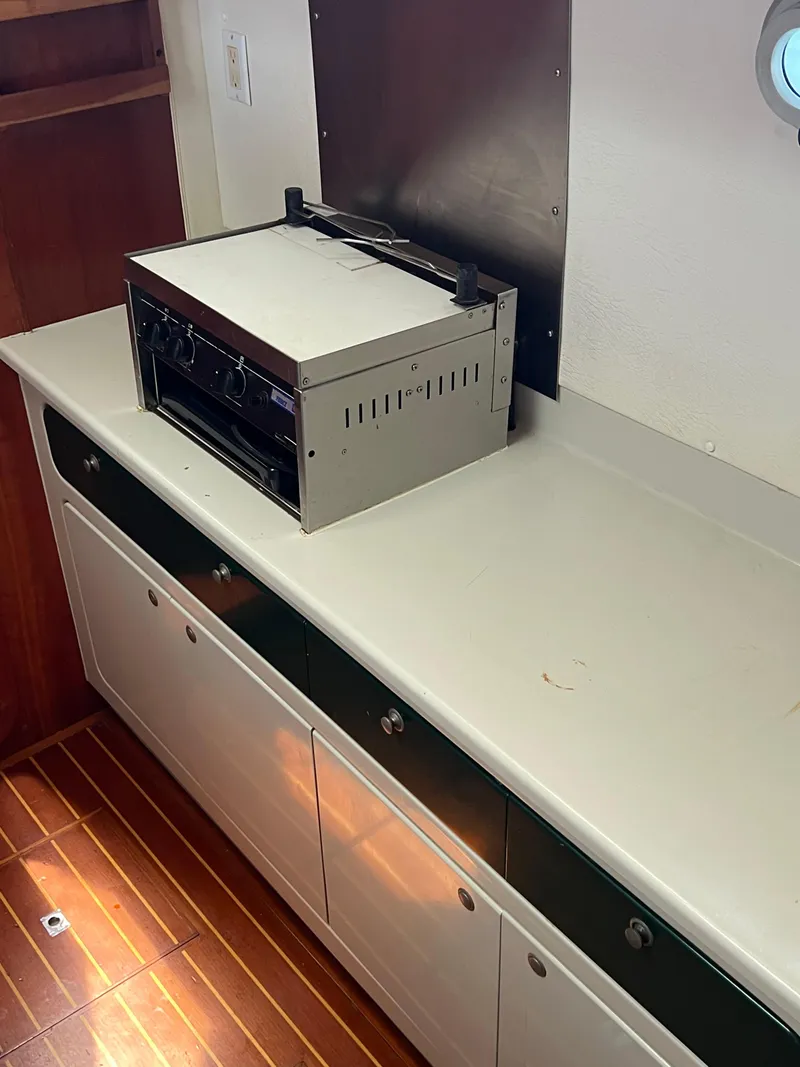 Slide: The Image of Interior of 1996 Prout 45 yacht with countertop and compact oven. - 42