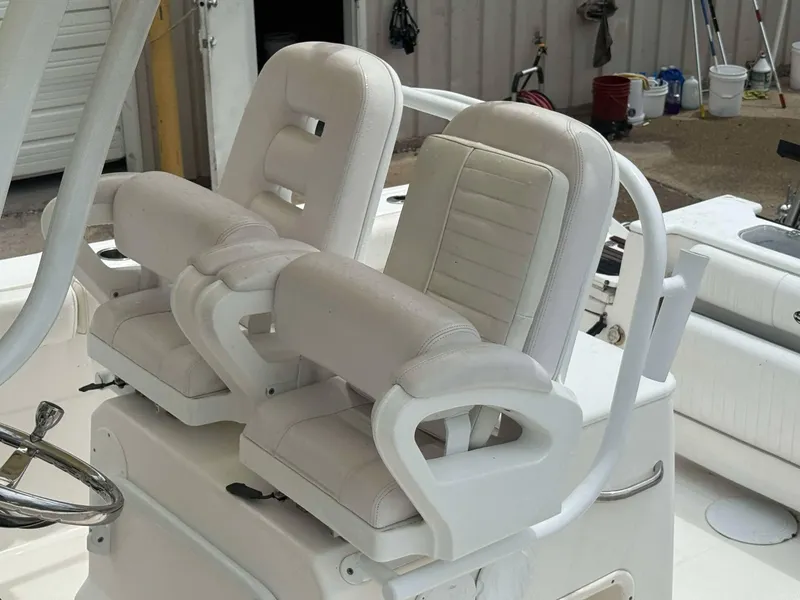 Slide: The Image of Dual white captain's chairs on 2015 Sea Fox 286 Commander boat. - 5